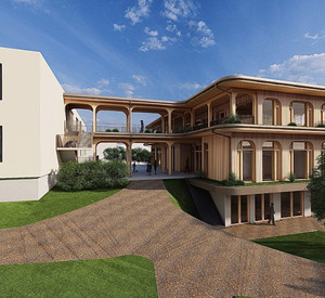 Modernes Schulgebäude mit Holzfassade und überdachtem Gang, angrenzend an einen weißen Baukörper mit großen Fenstern